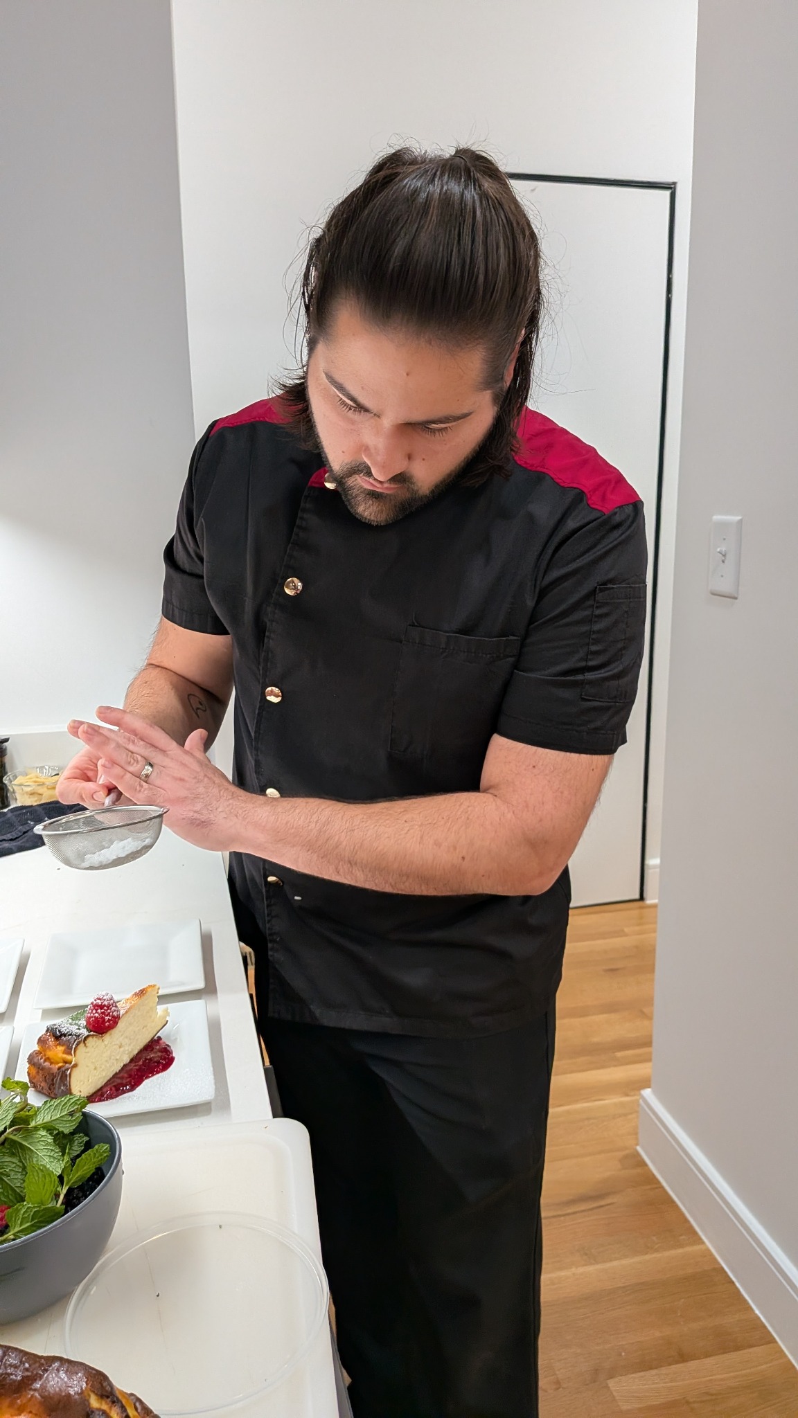 Chef Michael plating dessert